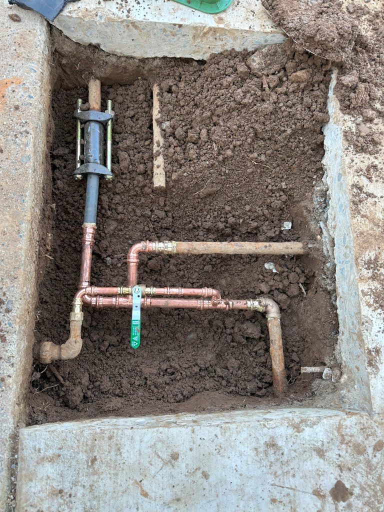 Completed repair of leaky sprinkler pipe